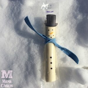snowman cheese stick on snow