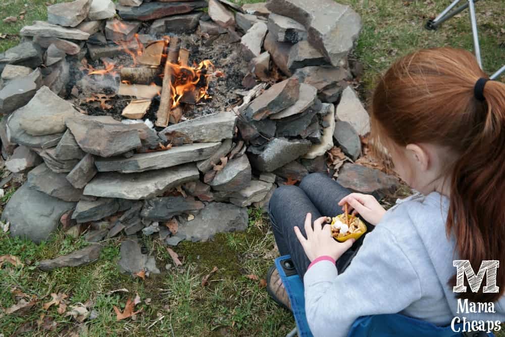 Kids Eating Snacks Around Campfire