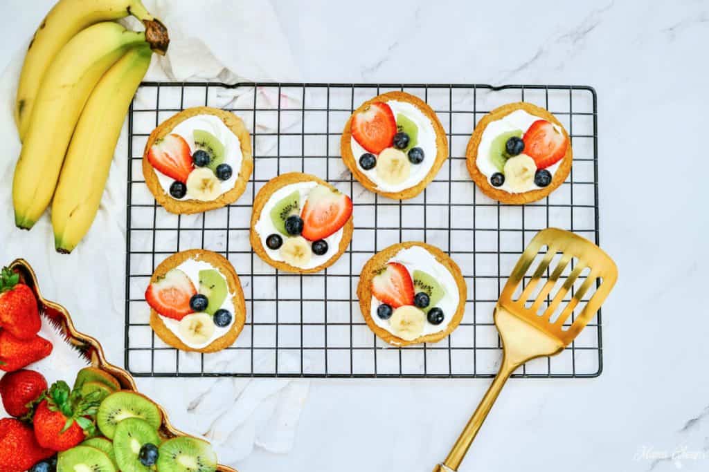 Fruit topped on frosted sugar cookies